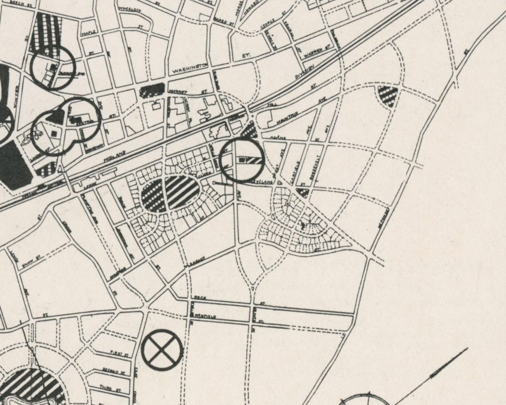A black and white map featuring street names and circular markers indicating specific areas or points of interest.