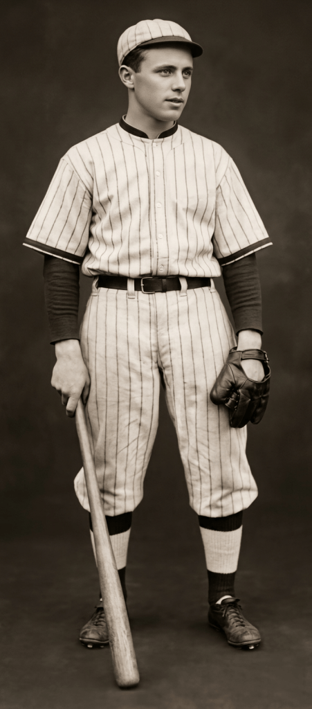 A young male baseball player standing with a bat in hand, wearing a vintage striped baseball uniform and a cap.